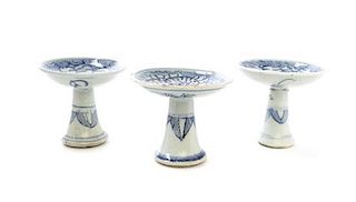 Three Blue and White Decorated Stem Cups, Height of tallest 3 5/8 inches.