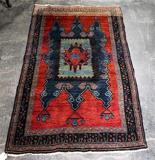 * A Kurdish Wool Rug 6 feet 10 inches x 4 feet.