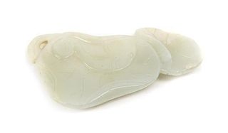A Carved Jade Ink Palette, Width 3 1/2 inches.