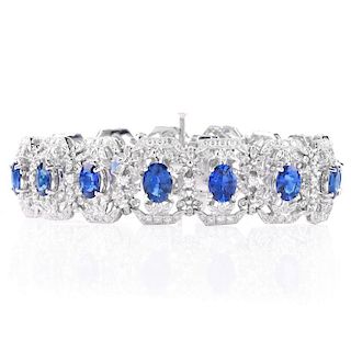 Approx. 11.70 Carat Oval Cut Sapphire, 2.95 Carat Round Brilliant Cut Diamond and 18 Karat White Gold Bracelet