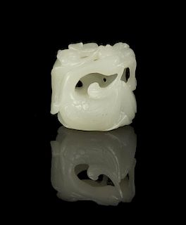 A Carved White Jade Hat Finial, Height 1 3/8 inches.
