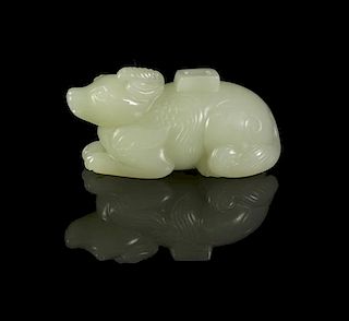 A Carved Jade Figure of a Qilin, Width 2 3/4 inches.