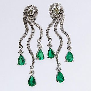 Approx. 1.80 Carat Pear Shape Emerald, 1.60 Carat Round Brilliant Cut Diamond and 18 Karat White Gold Earrings