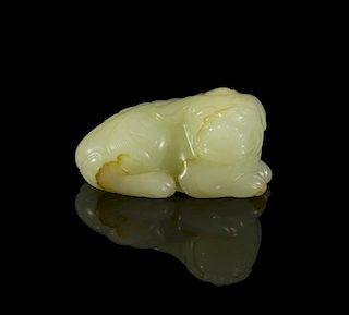 A Carved Jade Figure of a Bixie, Width 2 1/4 inches.
