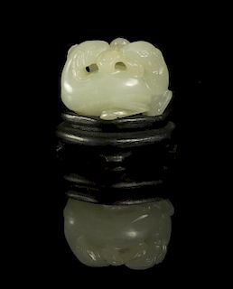 A Carved Jade Toggle of Horses, Width 1 5/8 inches.