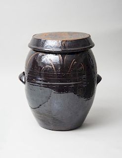 BLACK GLAZED POTTERY JAR AND COVER, POSSIBLY JAPANESE