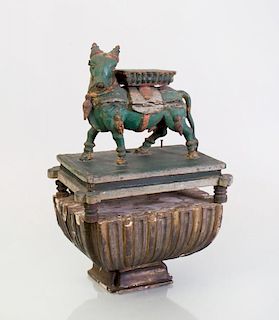 INDIAN CARVED AND PAINTED WOOD FIGURE OF A BULL
