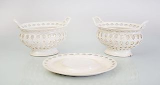 PAIR OF WEDGWOOD CREAMWARE RETICULATED CHESTNUT BASKETS AND A MATCHING STAND