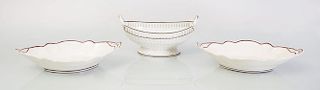 WEDGWOOD CREAMWARE TWO-HANDLED FRUIT COMPOTE AND A PAIR OF CREAMWARE NAVETTE-FORM DISHES