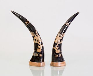 PAIR OF CARVED HORNS INSET WITH STRAW WORK EAGLES
