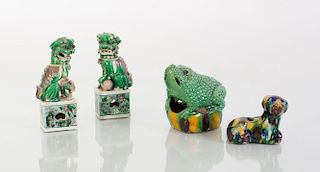 PAIR OF CHINESE GREEN, PURPLE AND YELLOW GLAZED BUDDHISTIC LIONS