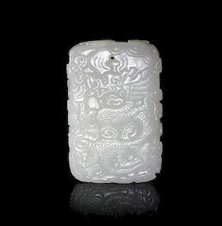 A Carved White Jade Pendant Plaque, Height 2 1/2 inches.