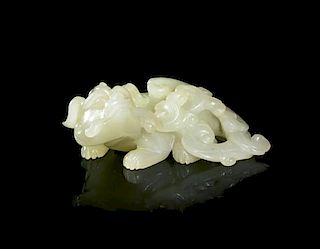 A White Jade Carving of a Bixie with Lingzhi, Width 2 7/8 inches.