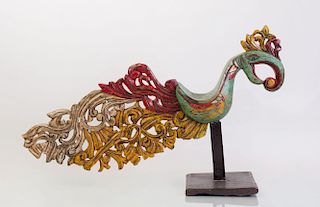 THAI POLYCHROME PAINTED WOOD FIGURE OF AN EXOTIC BIRD ON STAND