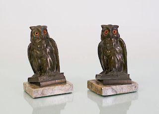 PAIR OF PATINATED METAL OWL-FORM BOOKENDS INSET WITH GLASS EYES
