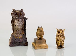 PAINTED CAST-IRON OWL-FORM BANK, A GILT-METAL PAPERWEIGHT, AND A GILT-METAL OWL DECORATION ON A PLINTH