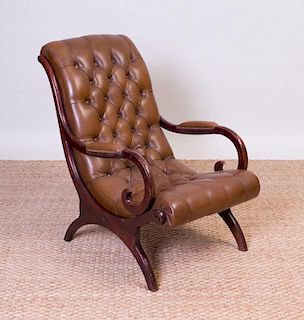 REGENCY STYLE CARVED MAHOGANY TUFTED LEATHER-UPHOLSTERED ARMCHAIR