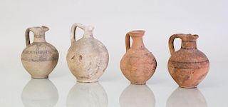 FOUR PAINTED POTTERY JUGS