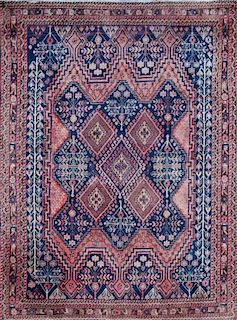 PERSIAN BLUE AND WINE-RED RUG