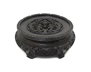 A Chinese Carved Hardwood Stand, Diameter 9 1/2 inches.