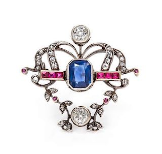 * A Victorian Silver Topped Gold, Diamond, Sapphire, and Synthetic Ruby Pendant/Brooch, 4.80 dwts.