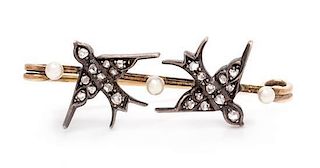 A Victorian Silver, Yellow Gold, Diamond and Pearl Double Swallow Brooch, 3.10 dwts.
