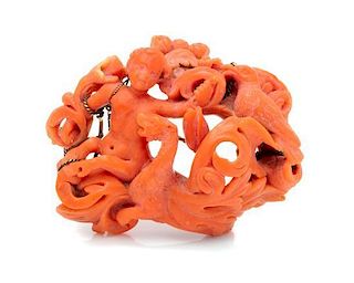 * A Georgian Carved Coral Brooch, 24.50 dwts.