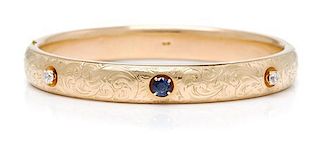 * An Art Nouveau 14 Karat Yellow Gold, Sapphire and Diamond Bangle Bracelet, Sloan & Co., 11.30 dwts.