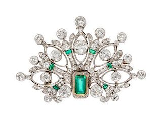 * A Platinum, Yellow Gold, Emerald and Diamond Pendant/Brooch, 21.30 dwts.
