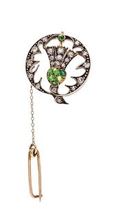 A Victorian Silver Topped Gold, Demantoid Garnet and Diamond Thistle Motif Pendant/Brooch, 3.10 dwts.