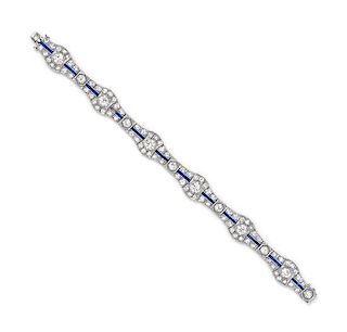 * An Art Deco Platinum, Diamond and Synthetic Sapphire Bracelet, 20.20 dwts.