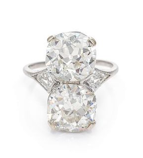 * An Art Deco Platinum and Diamond Ring, 3.20 dwts.