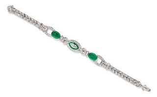 An Art Deco Platinum, Diamond and Emerald Bracelet, 11.75 dwts.