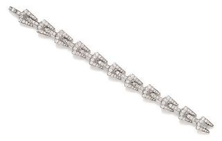 An Art Deco Platinum and Diamond Bracelet, Cartier, 15.90 dwts.