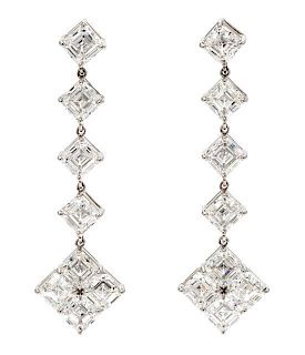 A Pair of Platinum and Diamond Dangle Earrings, 10.70 dwts.