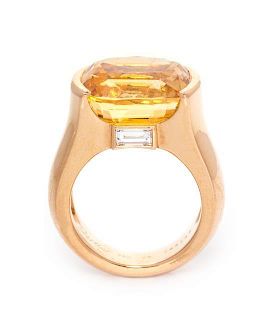 An 18 Karat Rose Gold, Orangy Yellow Sapphire and Diamond Ring, Cartier, 13.30 dwts.
