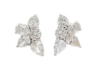 A Pair of 18 Karat White Gold and Diamond Cluster Earrings, 3.00 dwts.