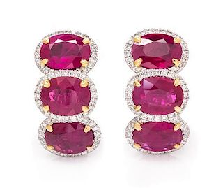 A Pair of 18 Karat Bicolor Gold, Ruby and Diamond Earclips, Piranesi, 7.35 dwts.