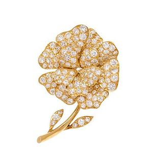 A Yellow Gold and Diamond Flower Pendant/Brooch, 13.40 dwts.