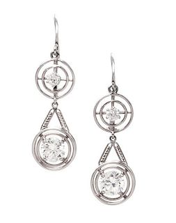 A Pair of Platinum and Diamond Pendant Earrings, 3.60 dwts.