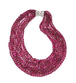 An 18 Karat White Gold, Diamond and Graduated Multistrand Pink Tourmaline Bead Necklace, 163.90 dwts.