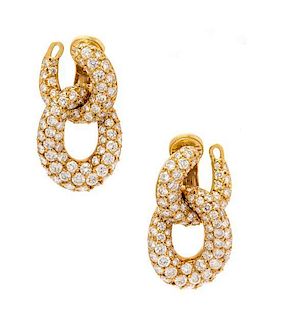 * A Pair of 18 Karat Yellow Gold and Diamond Curb Link Earclips, 12.80 dwts.