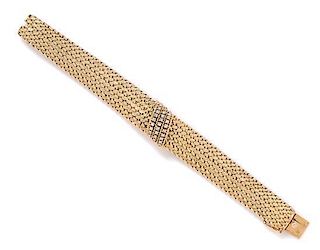 A 14 Karat Yellow Gold and Diamond Surprise Wristwatch, Berlis, 33.80 dwts.