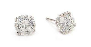 A Pair of Platinum and Diamond Stud Earrings, 1.90 dwts.