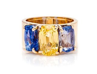 A Yellow Gold, Yellow Sapphire and Sapphire Ring, 7.80 dwts.