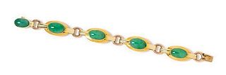 * A Retro 14 Karat Bicolor Gold and Jadeite Bracelet, Gump's, 29.60 dwts.