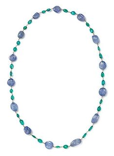 A White Gold, Carved Sapphire and Emerald Bead Necklace, 40.70 dwts.