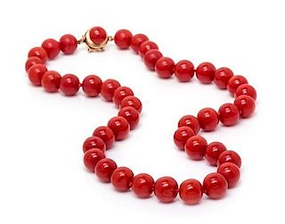 * A Single Strand Coral Bead Necklace, 36.20 dwts.