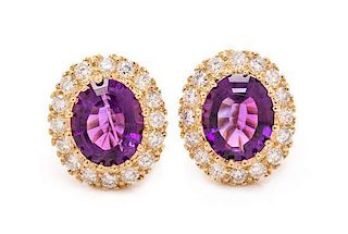 * A Pair of 14 Karat Yellow Gold, Amethyst and Diamond Earclips, 6.00 dwts.