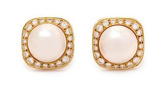 * A Pair of 18 Karat Yellow Gold, Cultured Mabe Pearl and Diamond Earclips, 11.00 dwts.